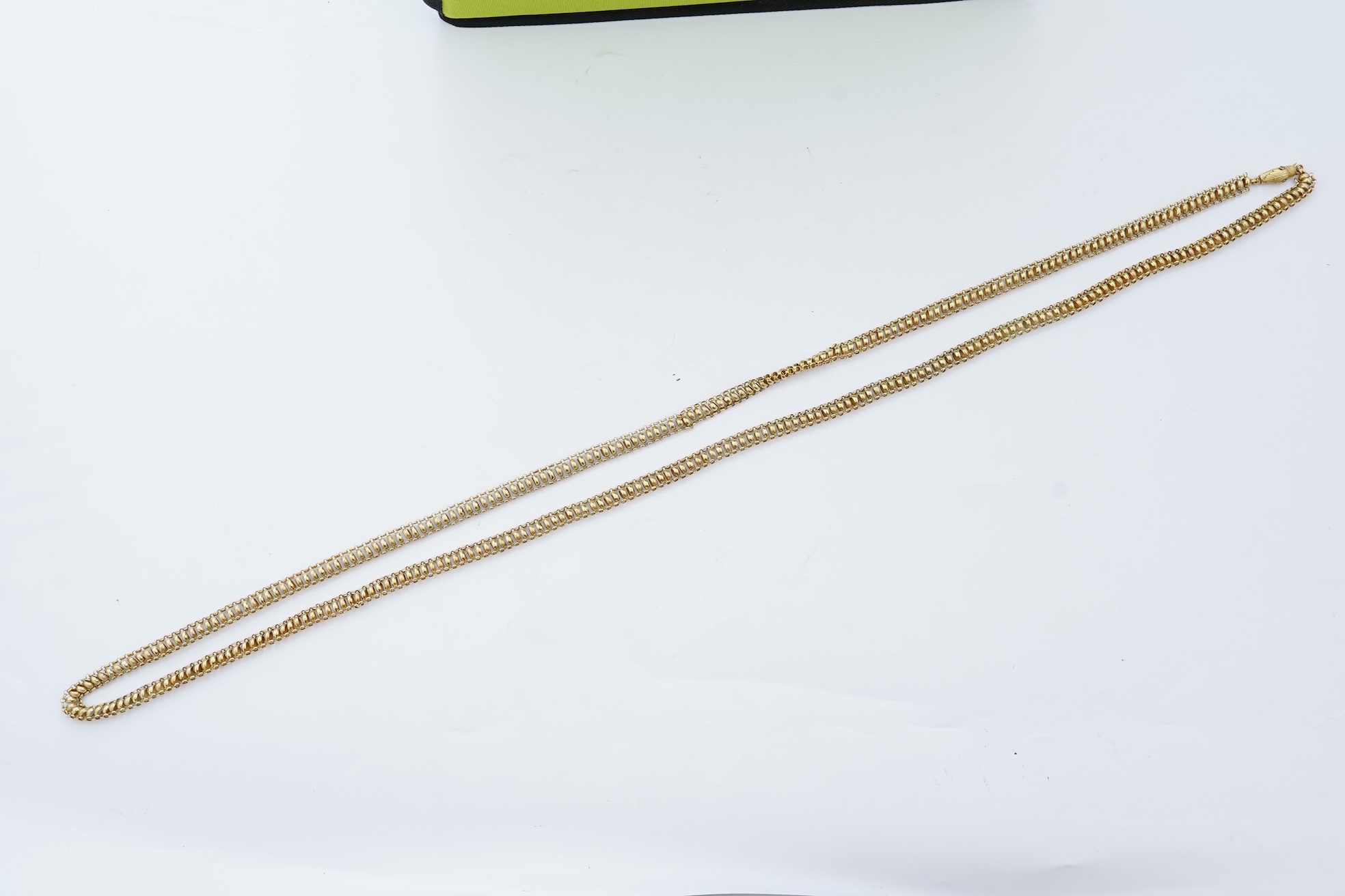 A gold long guard chain, 19th century